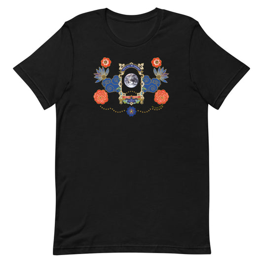 A black t-shirt with a graphic print in the center featuring stars and a planetary design, surrounded by a ornate vintage Victorian style frame with flowers design.